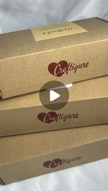Stacked Craftigure shipping boxes ready to send