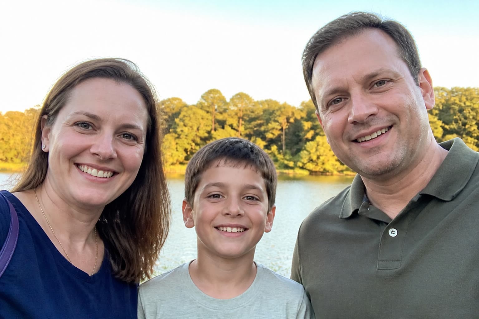Example landscape phone photo of a family at a cottage lake, used to show a 2×3 crop versus a square crop
