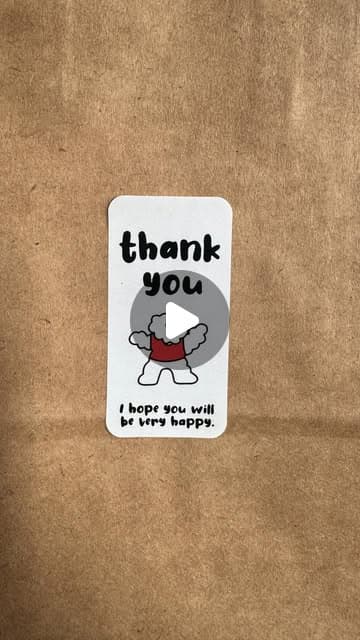 Thank-you card packed with a Craftigure order on kraft paper